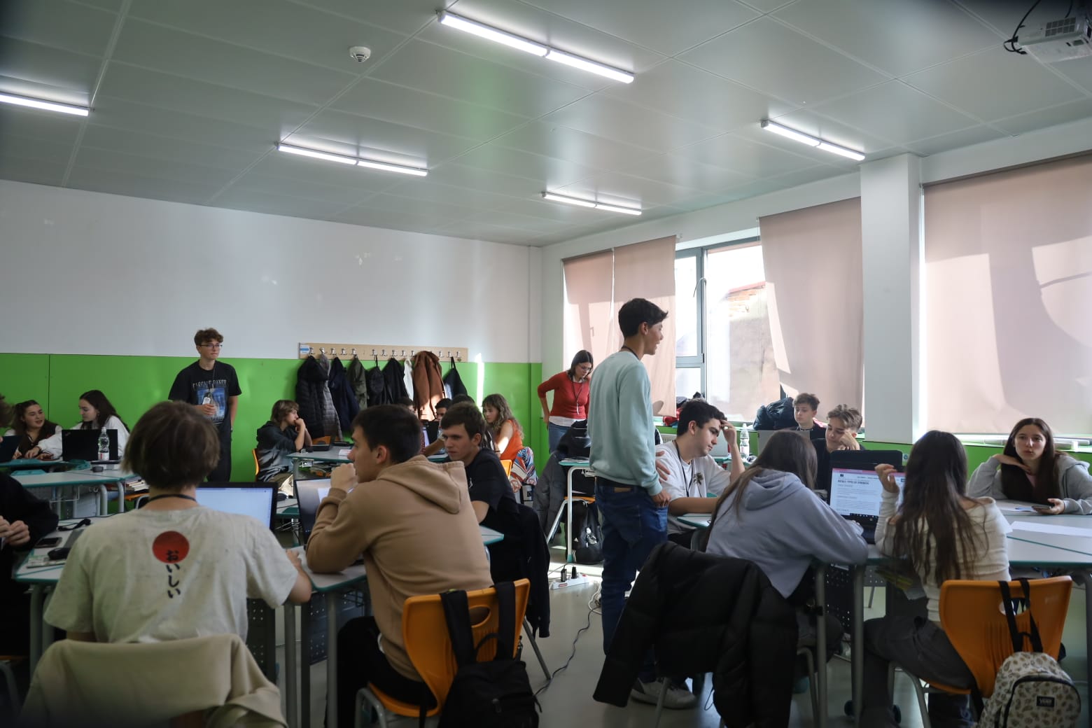 A classroom of students designing their settlement at the ROSDC local stage in Cluj-Napoca