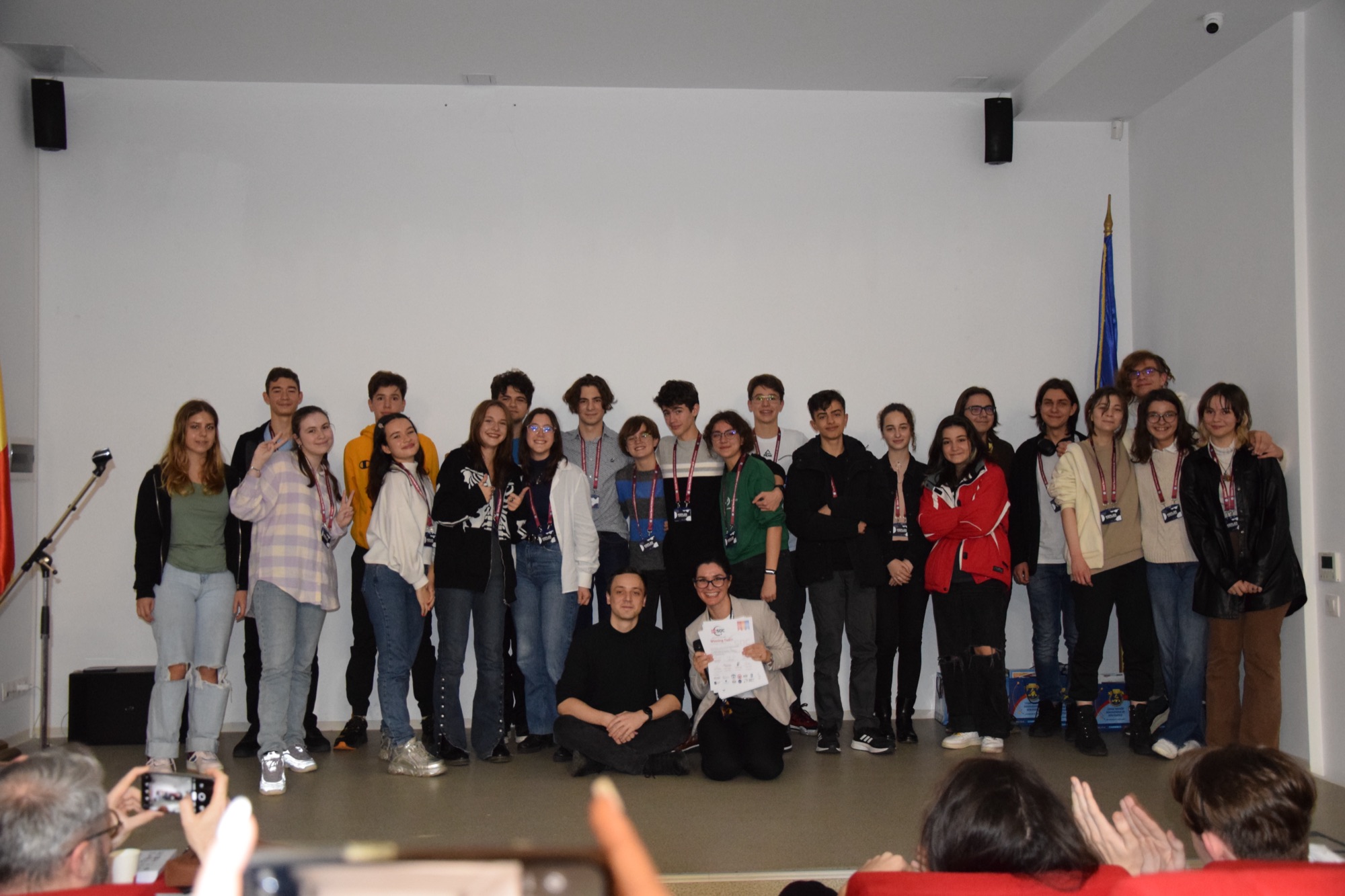 Group photo of the participants on stage at the ROSDC local stage in Bucharest
